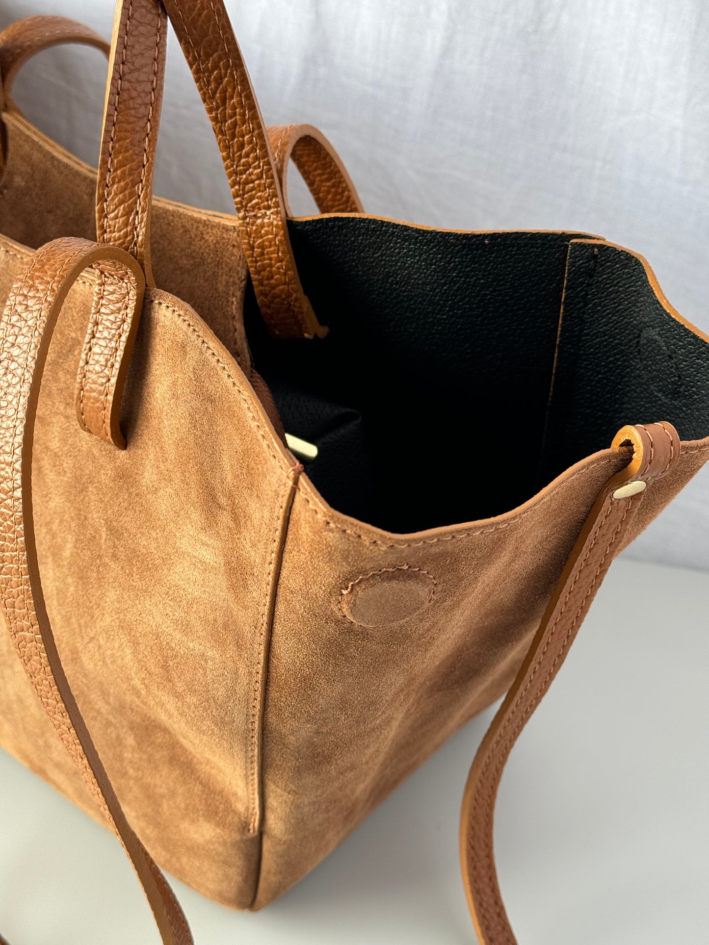 borsa con doppi manici magnetici
