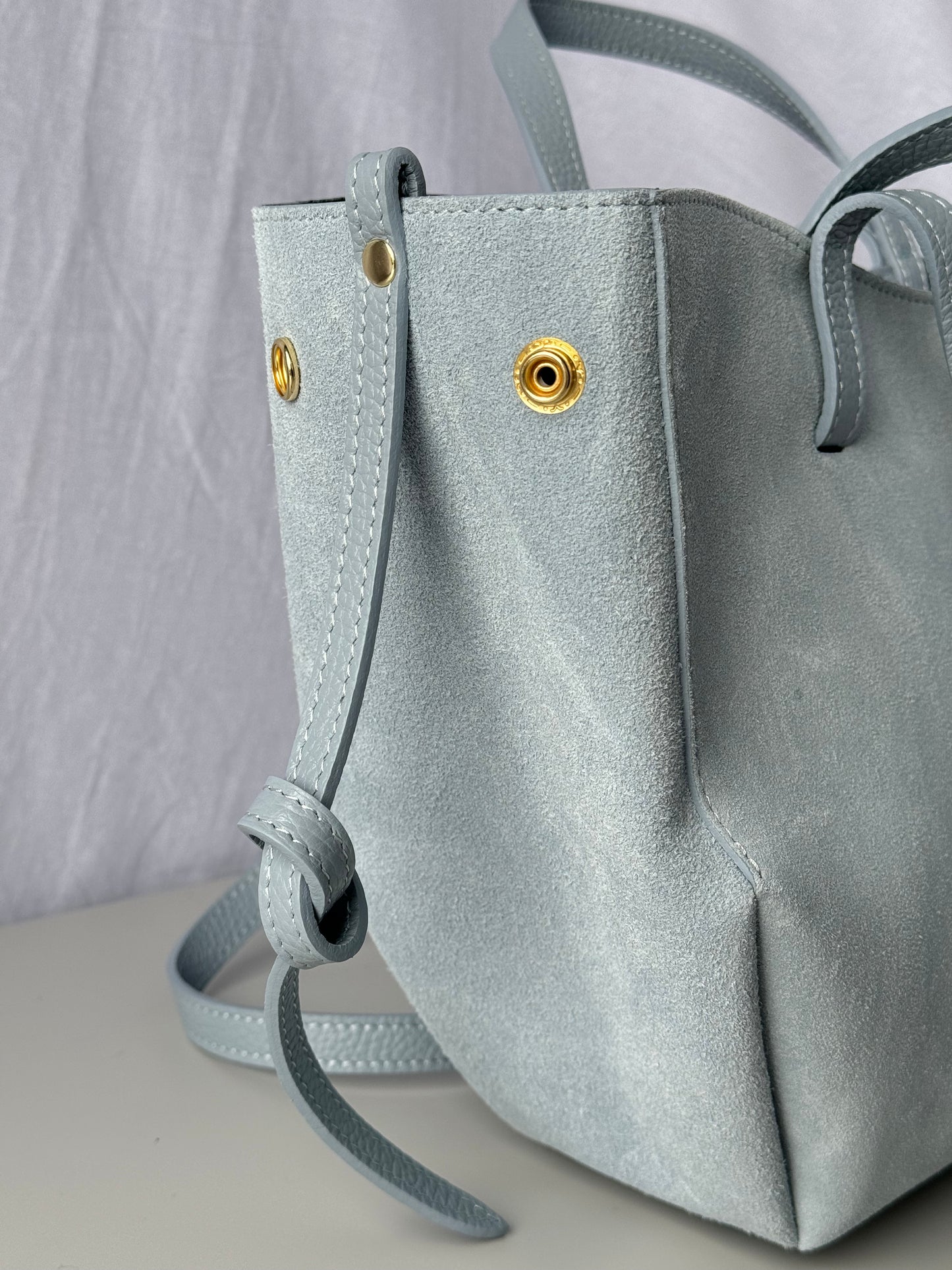 borsa con doppi manici e bottoni
