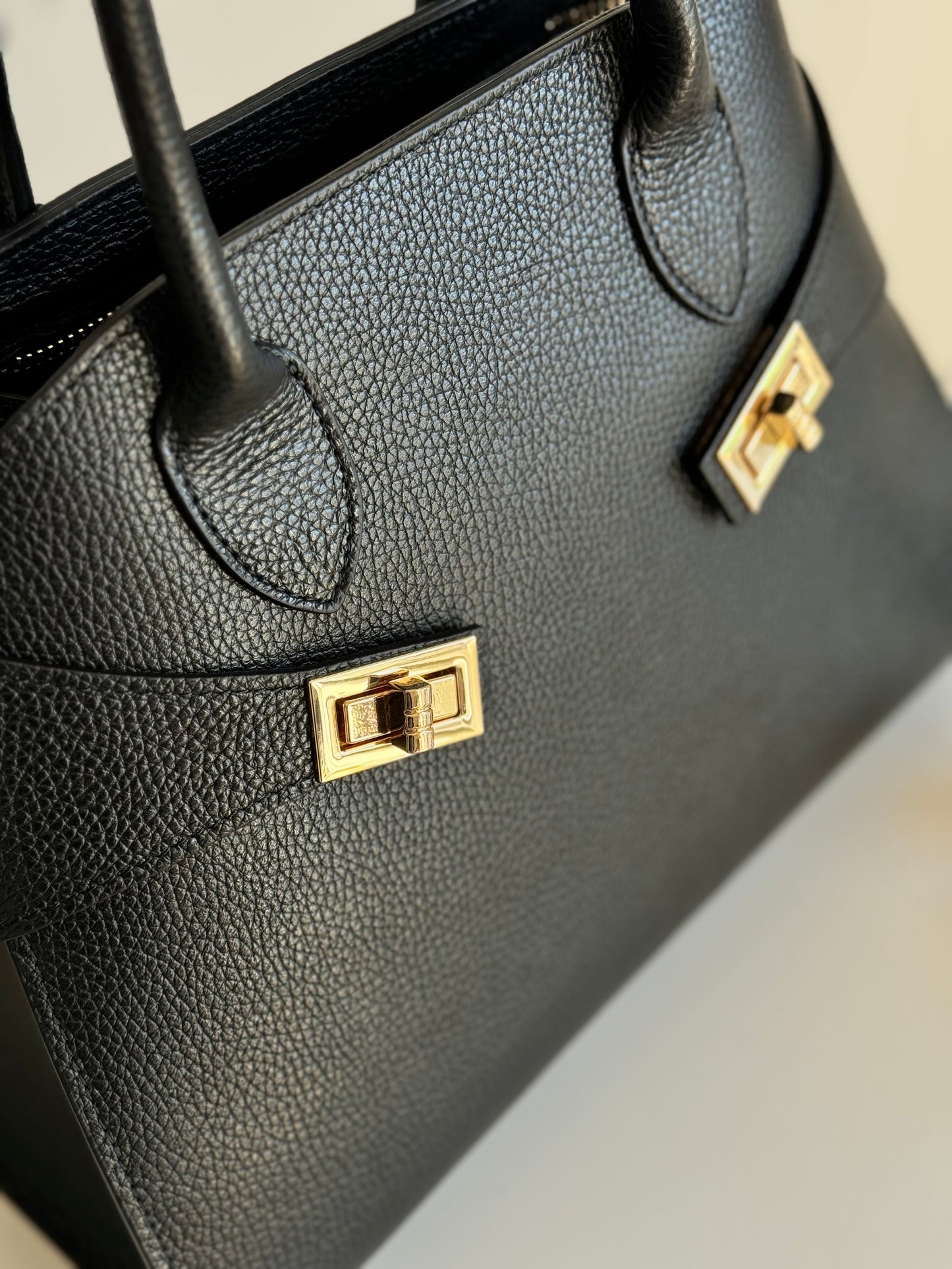 borsa con manico e tracolla