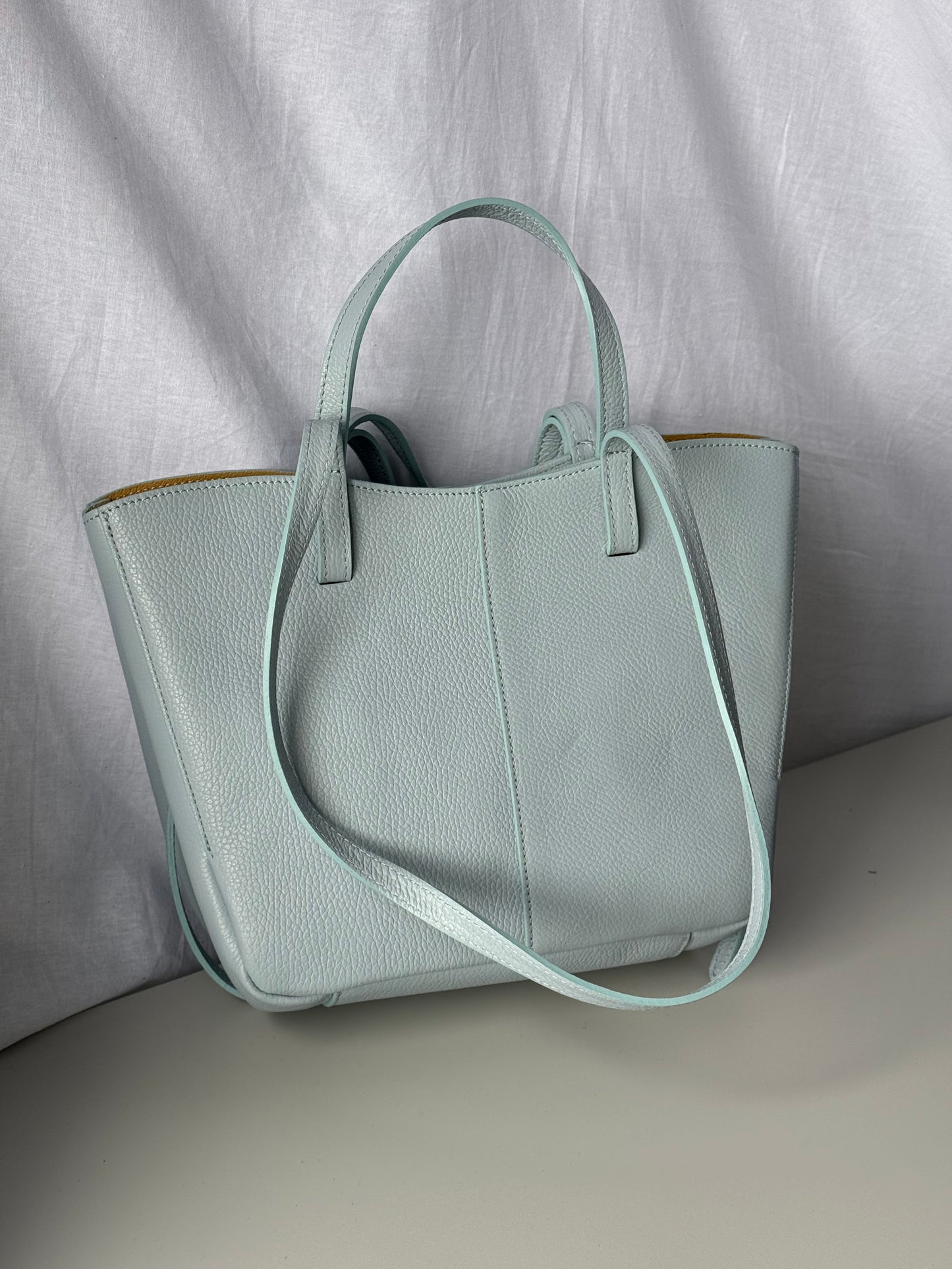 Borsa con doppio manico in pelle