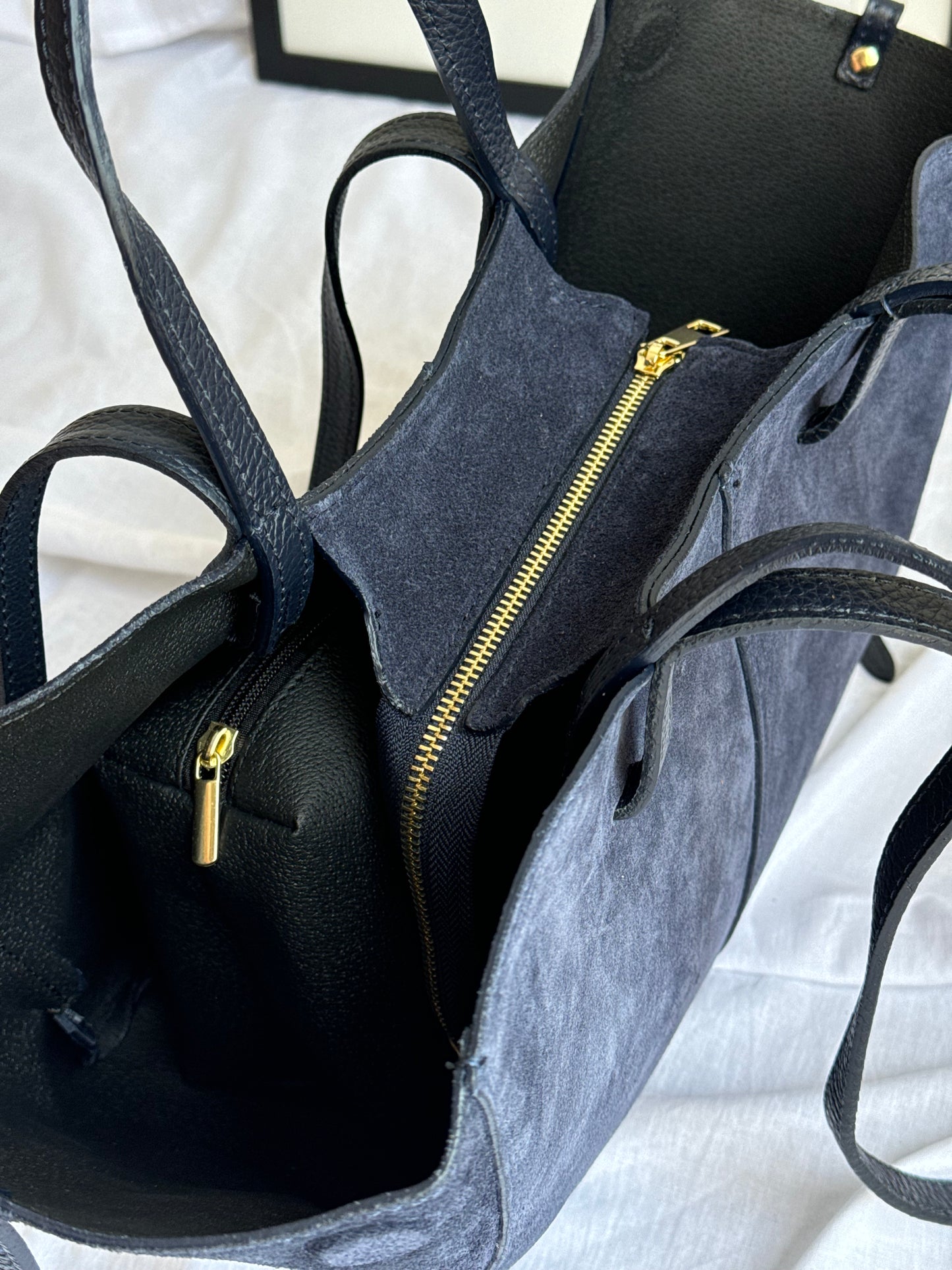 borsa con doppi manici magnetici