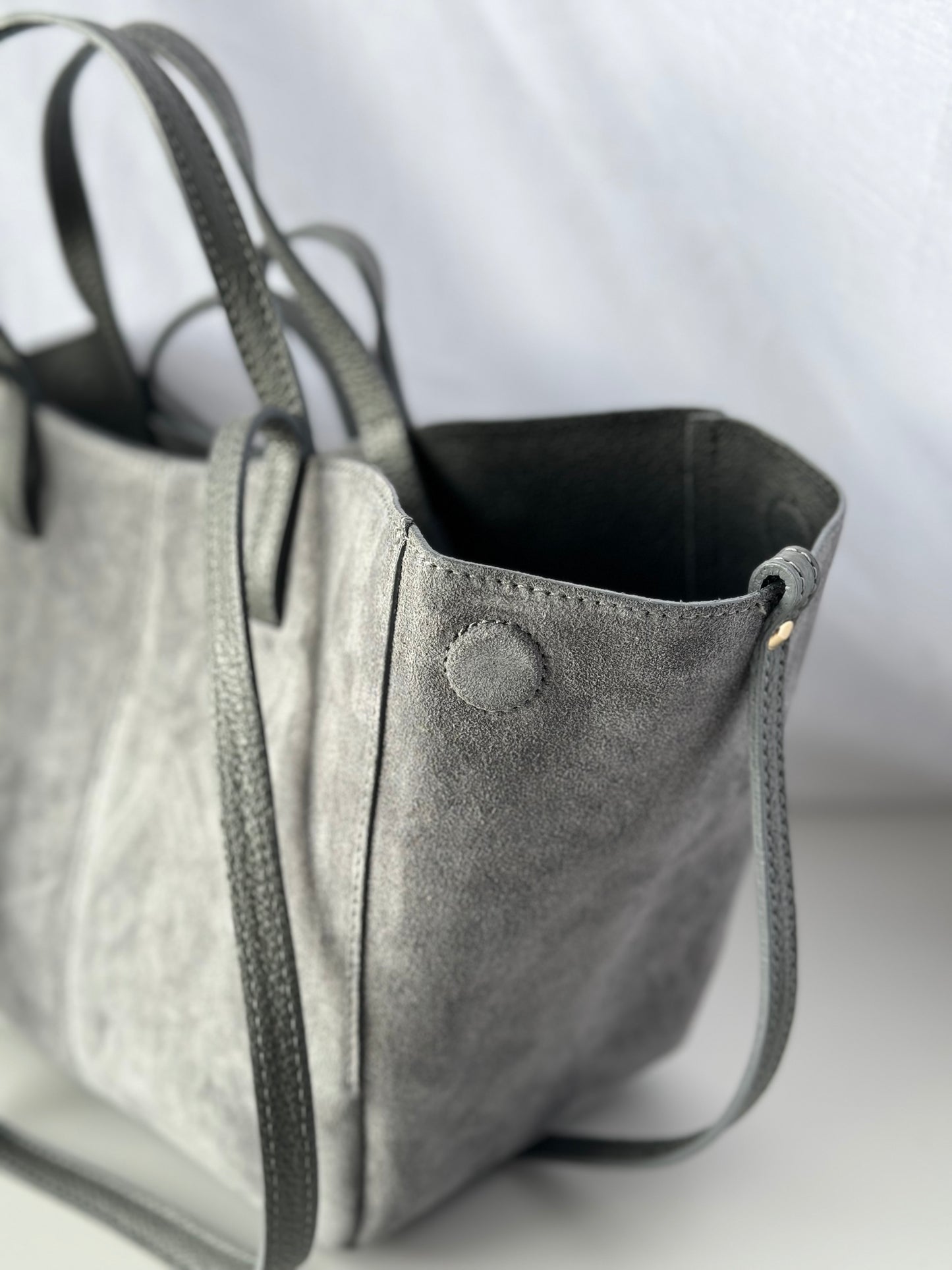 borsa con doppi manici magnetici