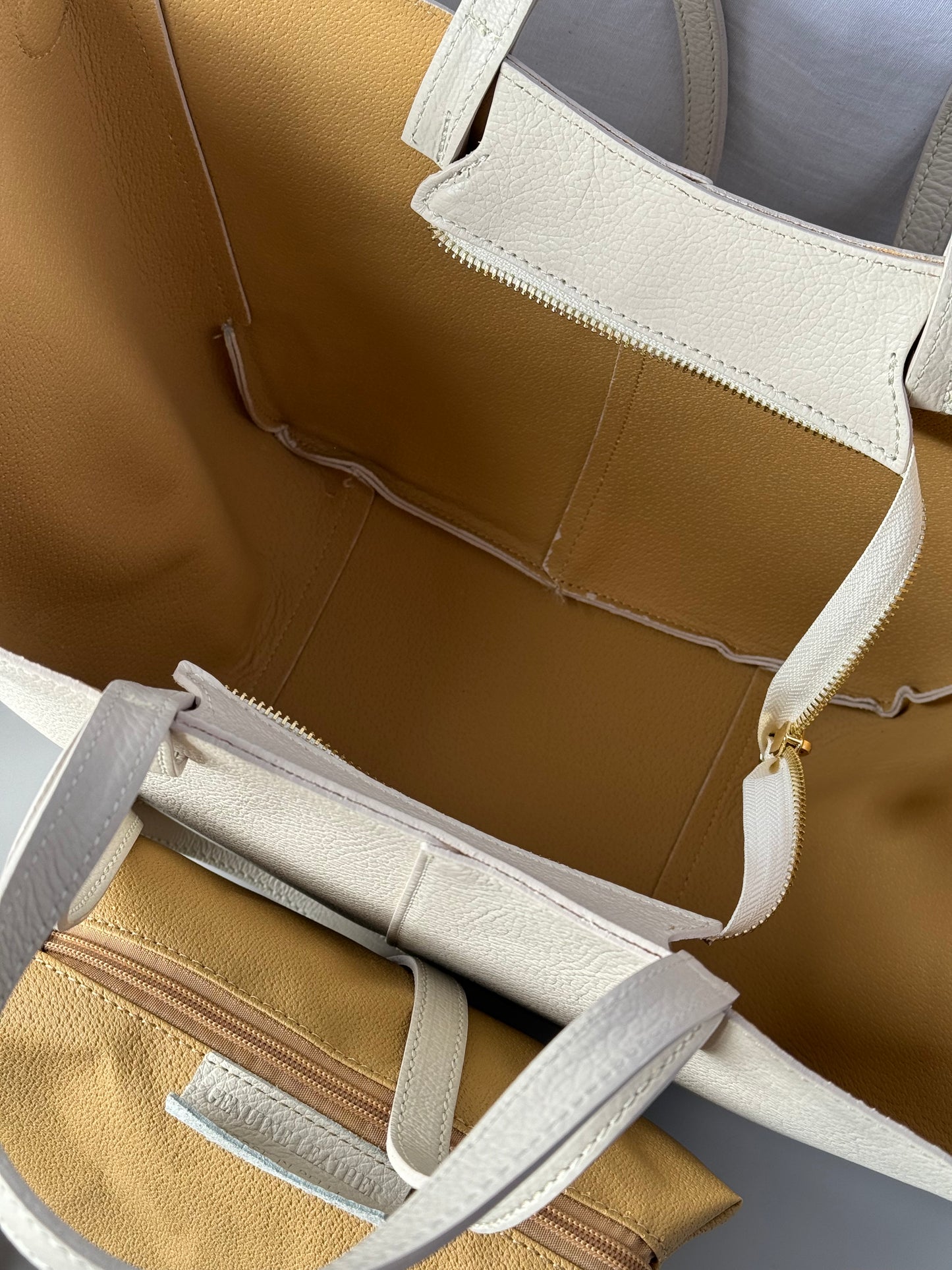 Borsa con doppio manico in pelle