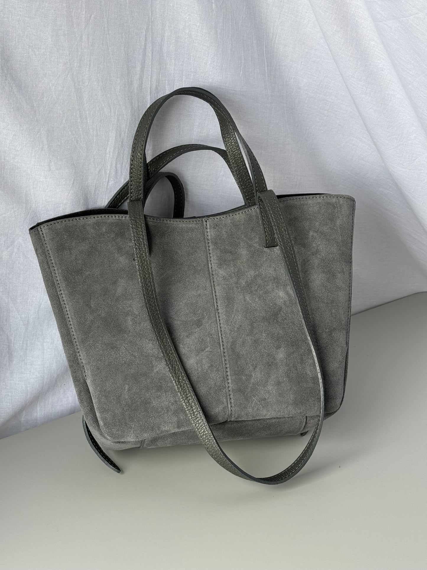 borsa con doppi manici magnetici