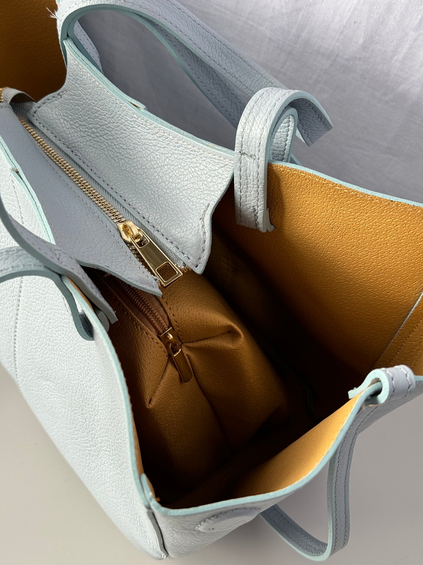 Borsa con doppio manico in pelle