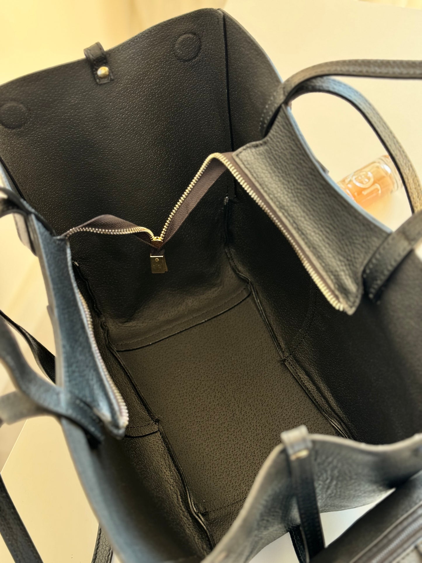 Borsa con doppio manico in pelle
