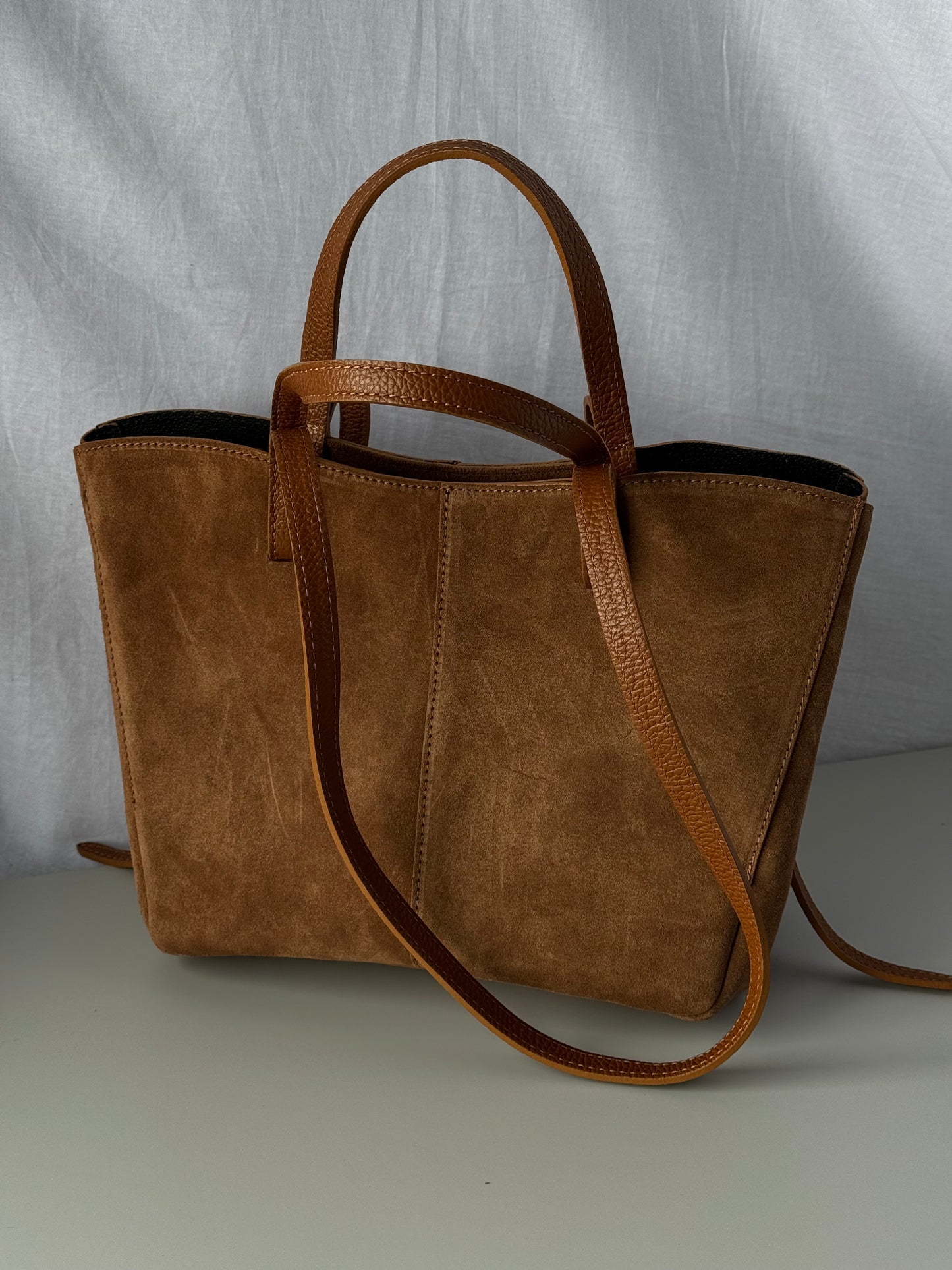 borsa con doppi manici magnetici