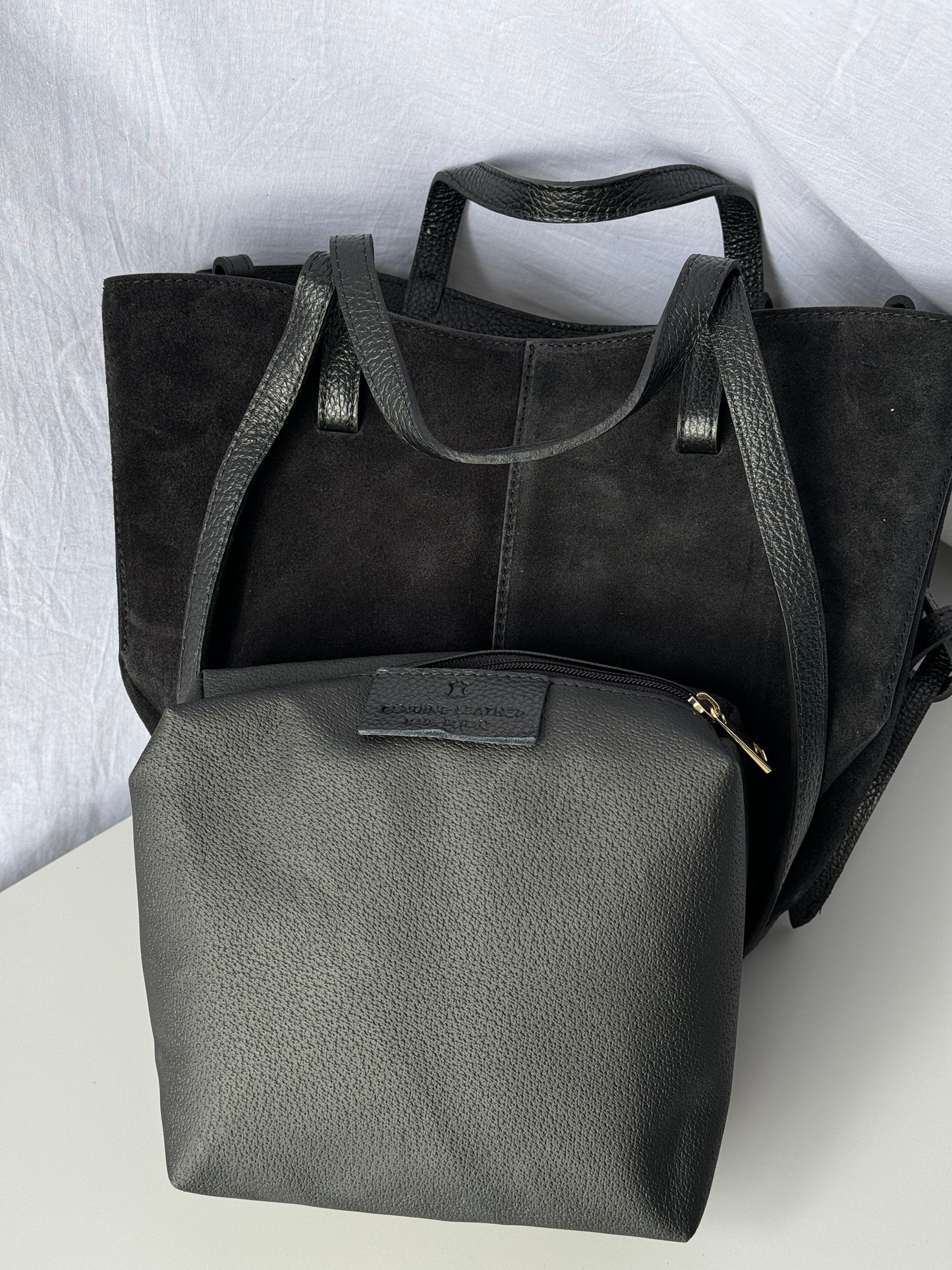borsa con doppi manici e bottoni