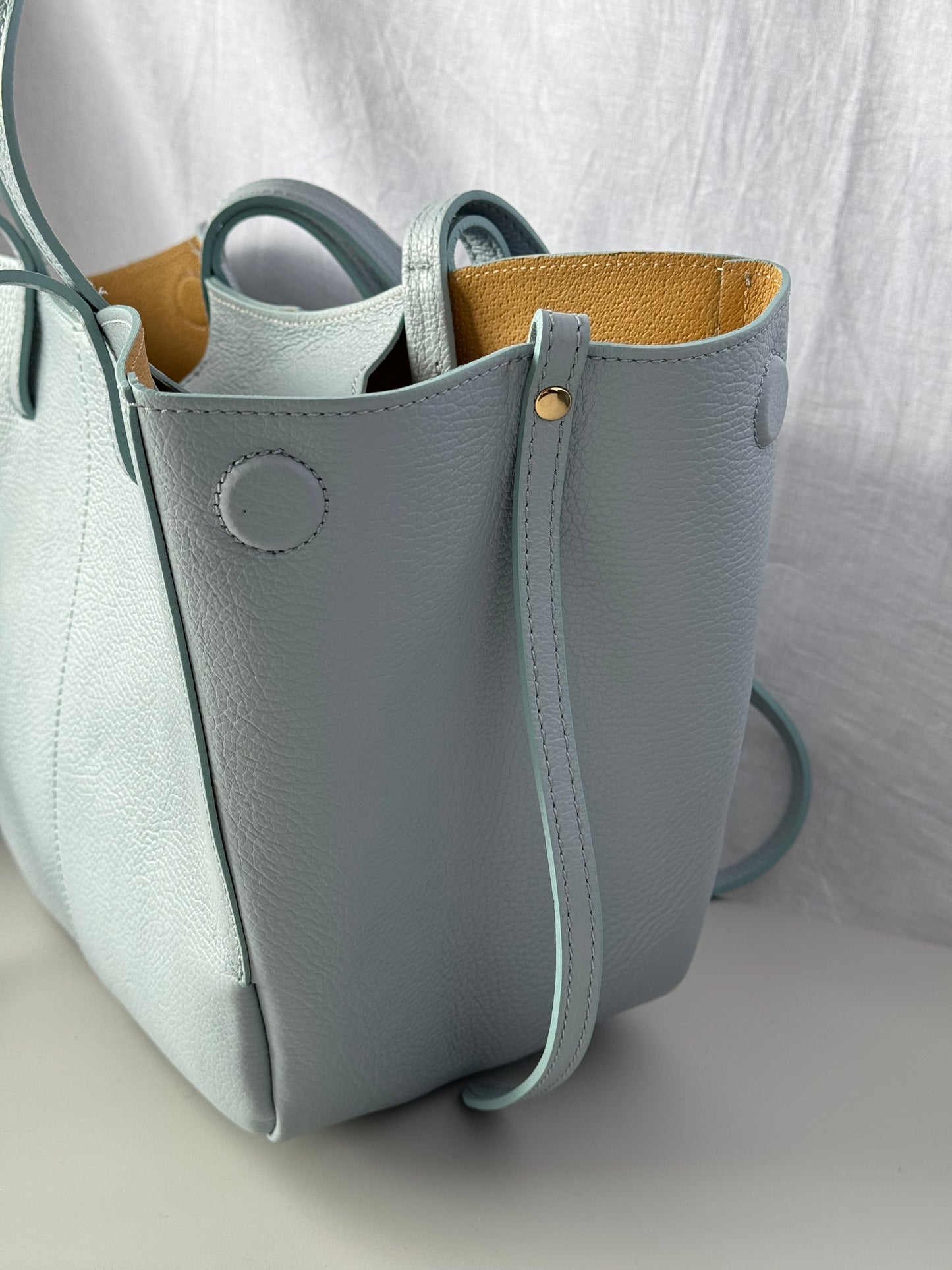 Borsa con doppio manico in pelle
