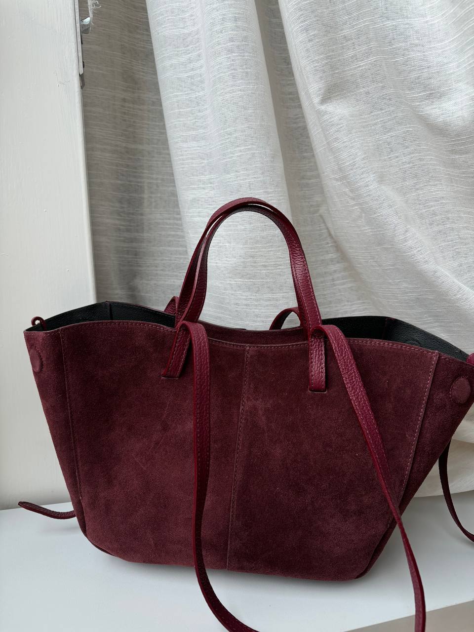 borsa con doppi manici magnetici