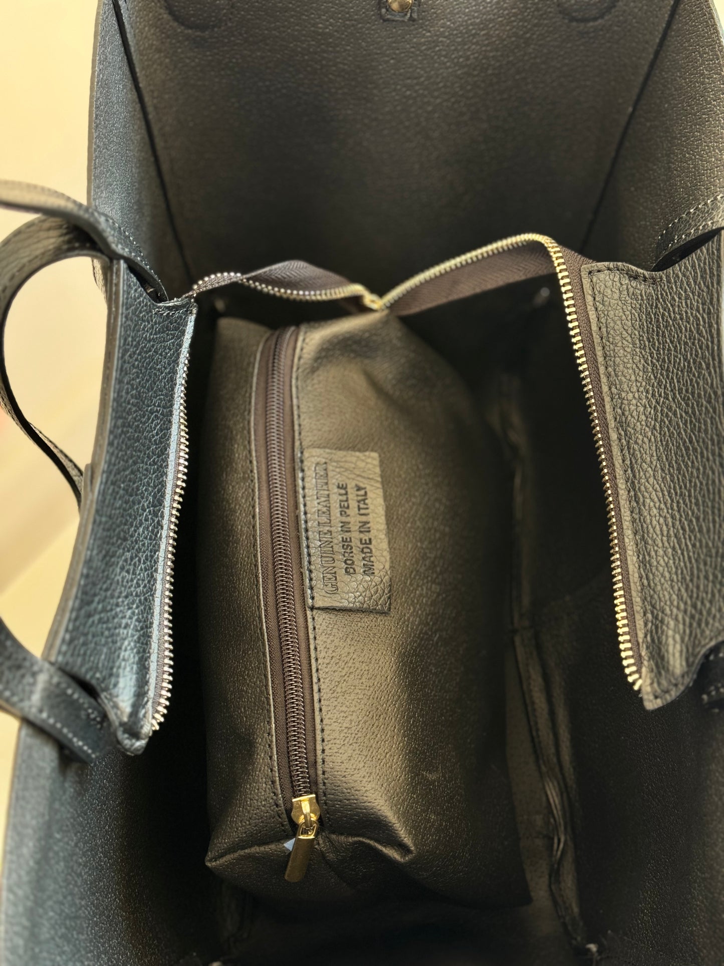 Borsa con doppio manico in pelle