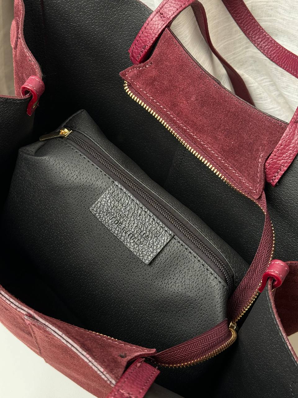 borsa con doppi manici magnetici