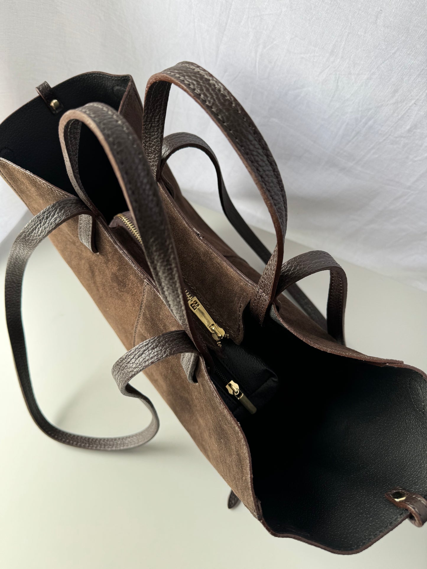 borsa con doppi manici magnetici