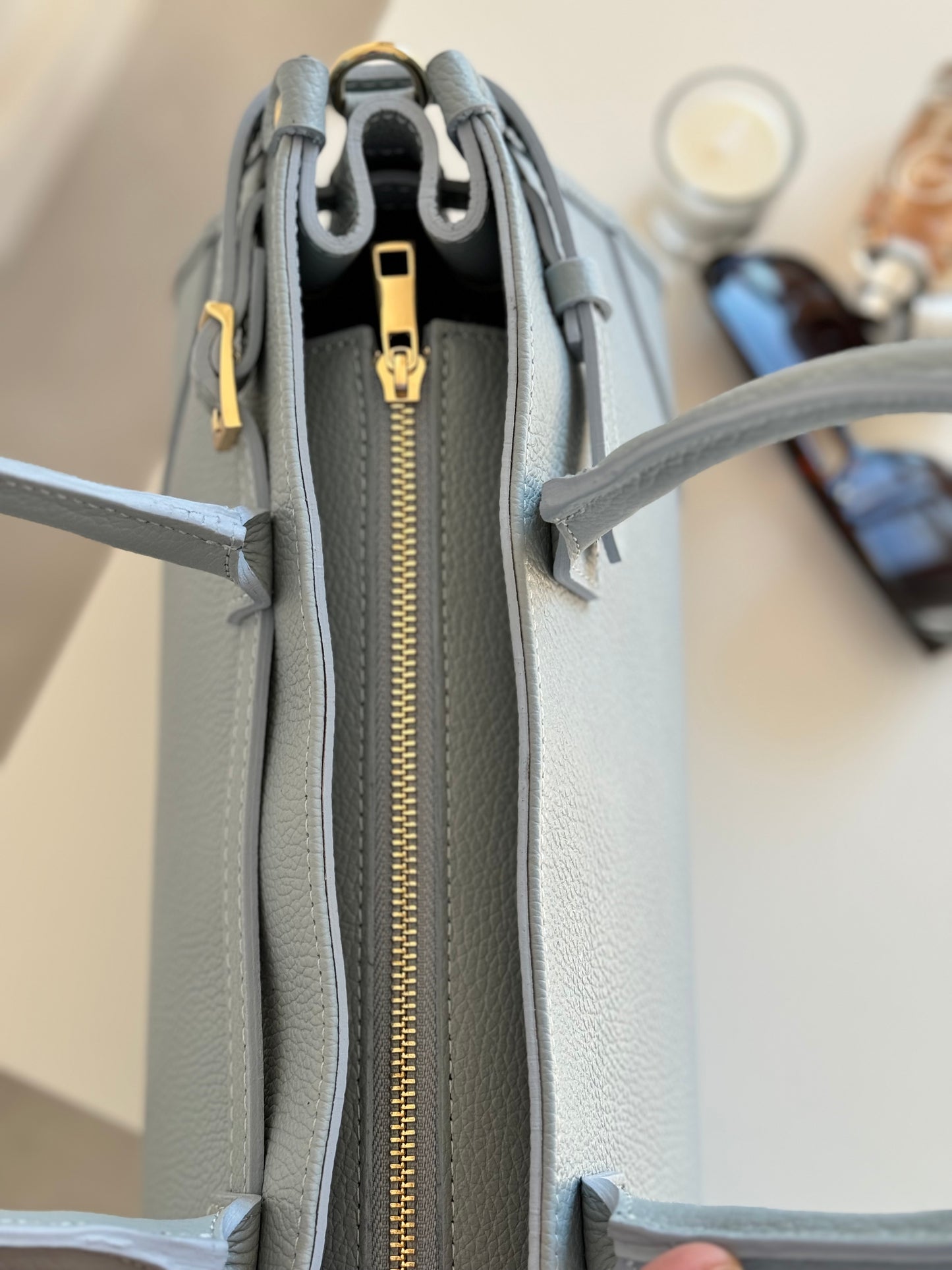borsa con manico e tracolla