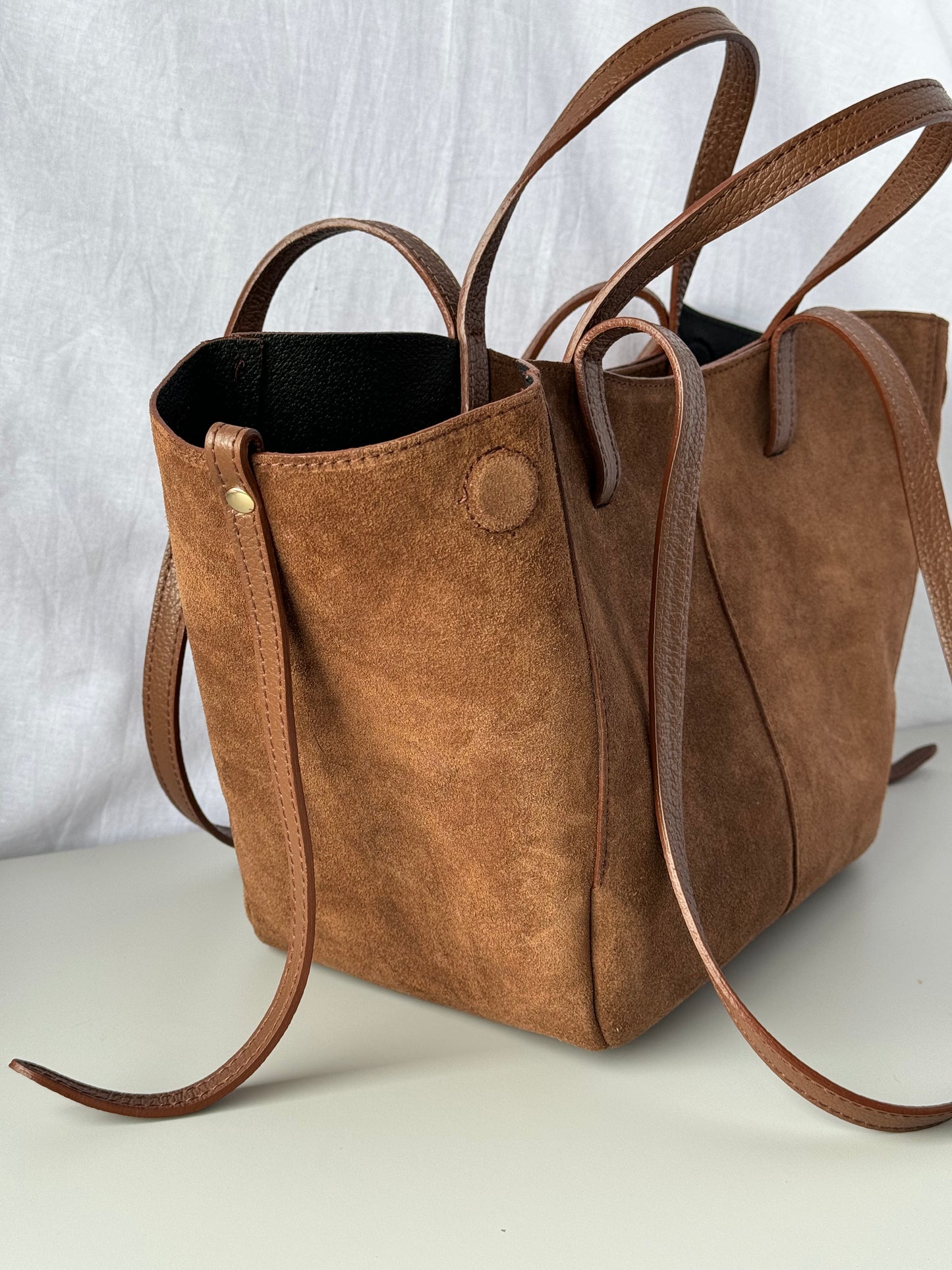 borsa con doppi manici magnetici