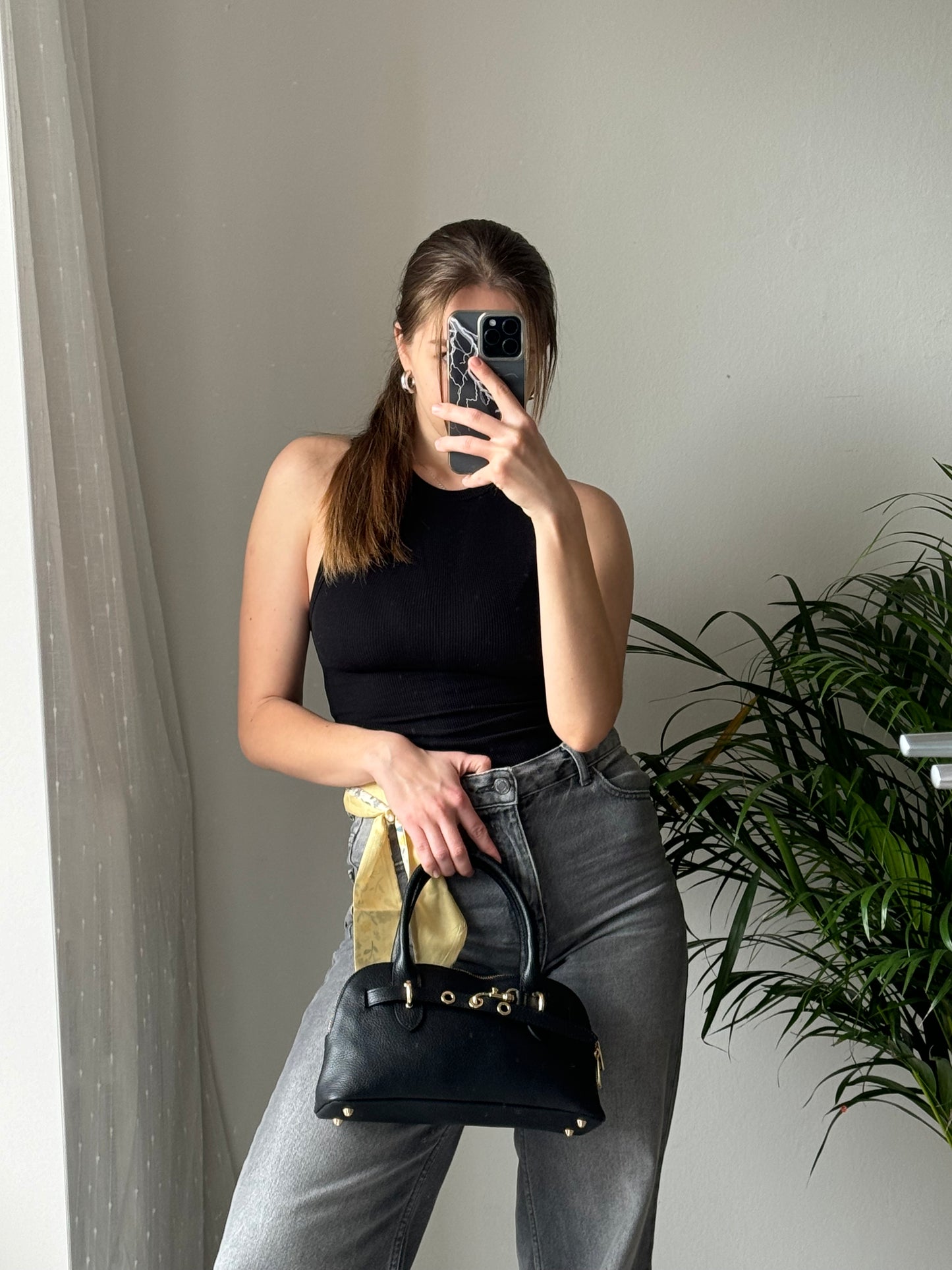 borsa a mano con tracolla
