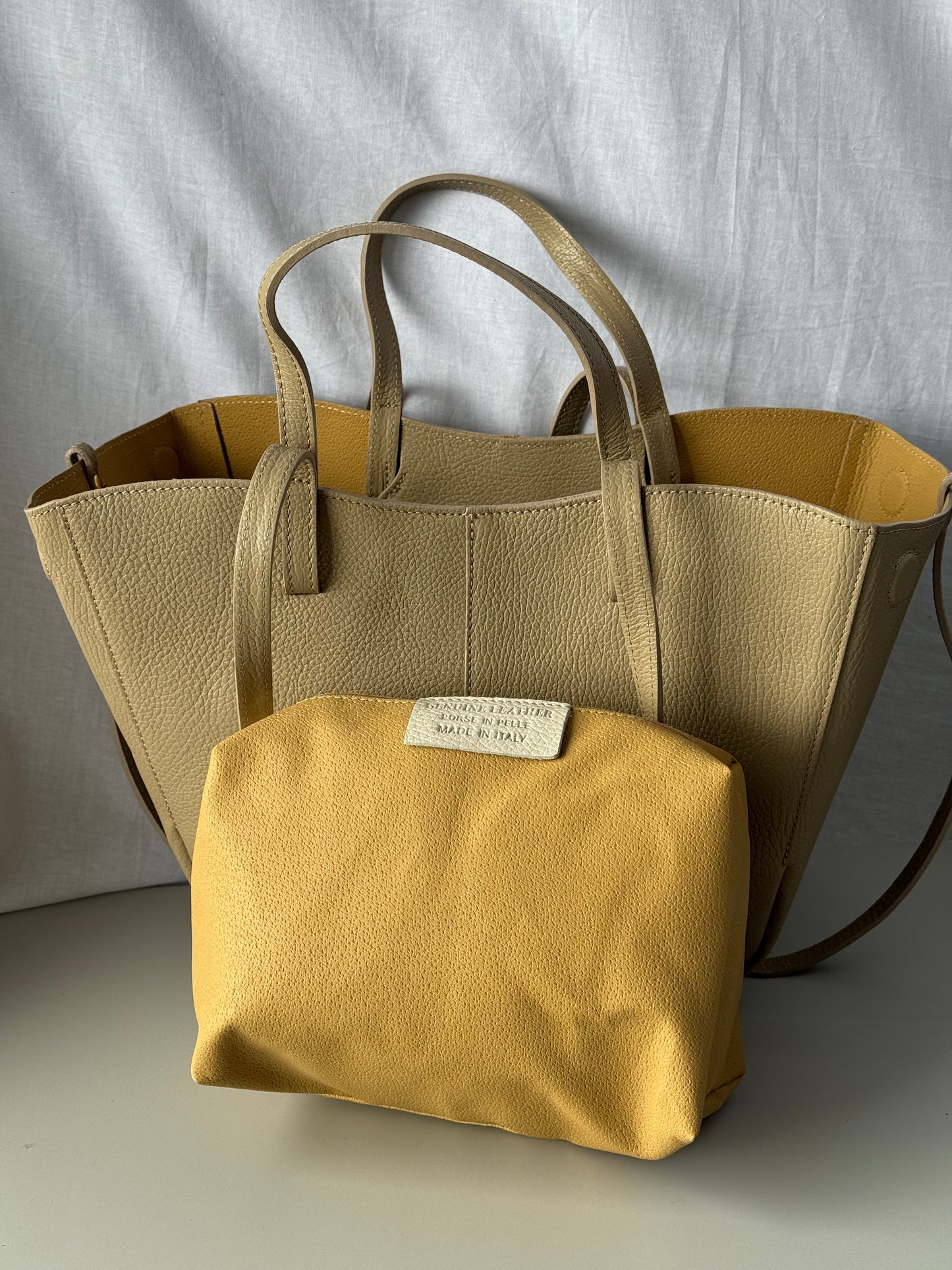 Borsa con doppio manico in pelle