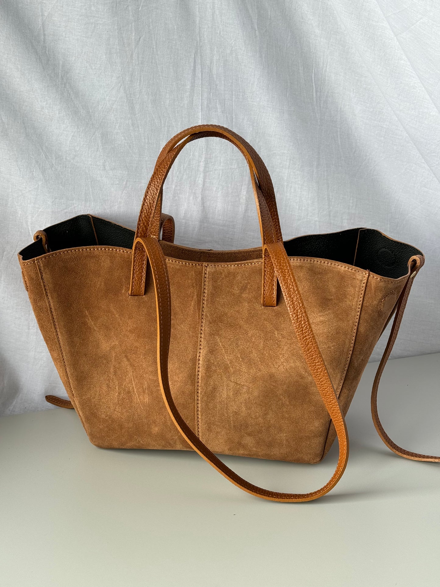 borsa con doppi manici magnetici