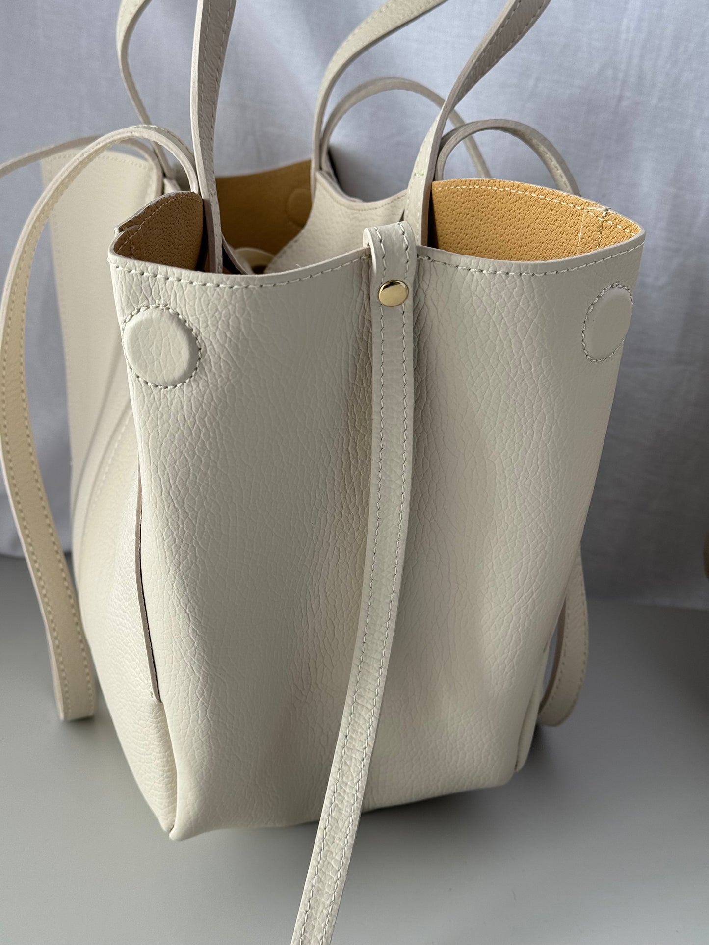 Borsa con doppio manico in pelle