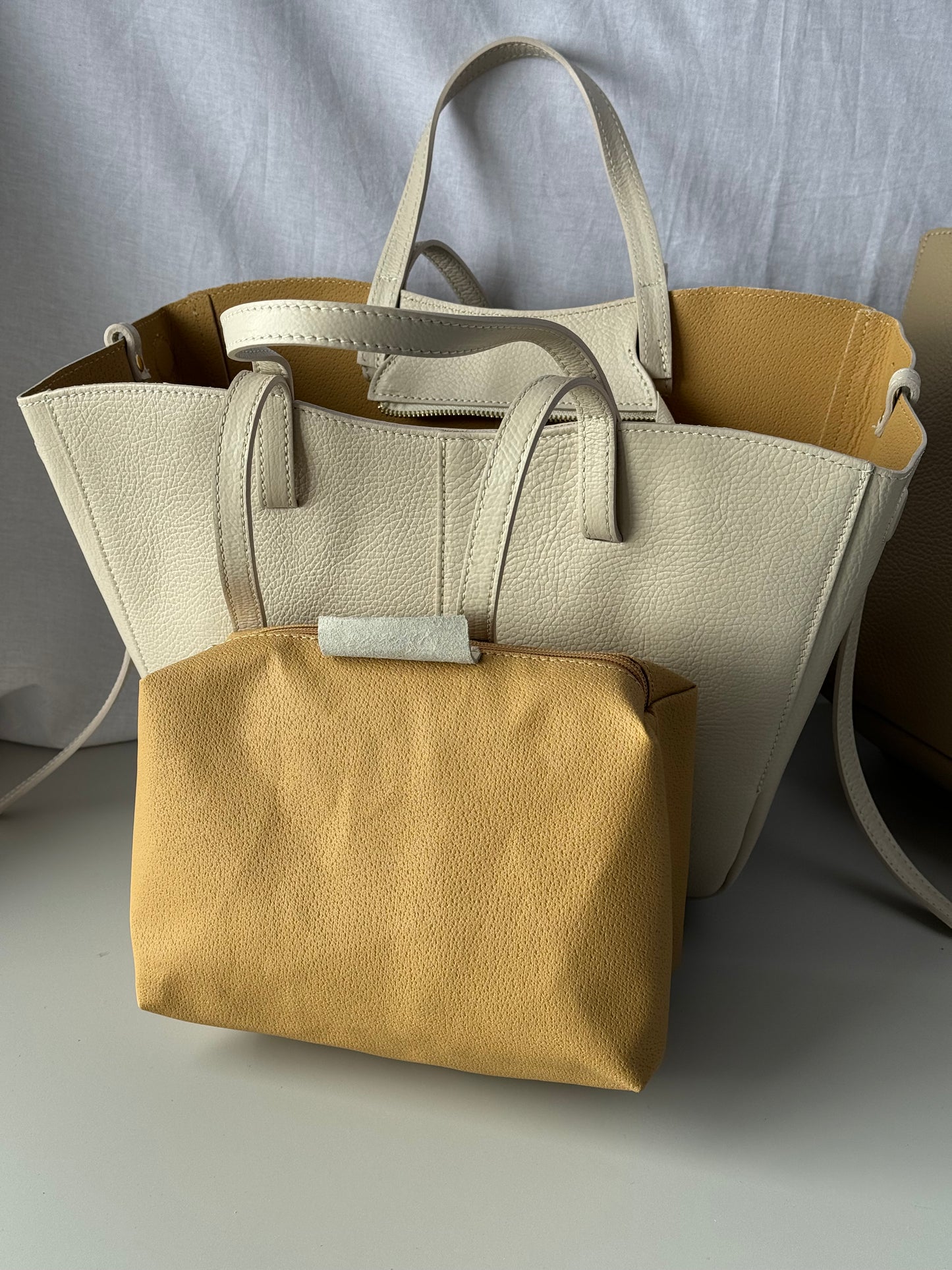 Borsa con doppio manico in pelle