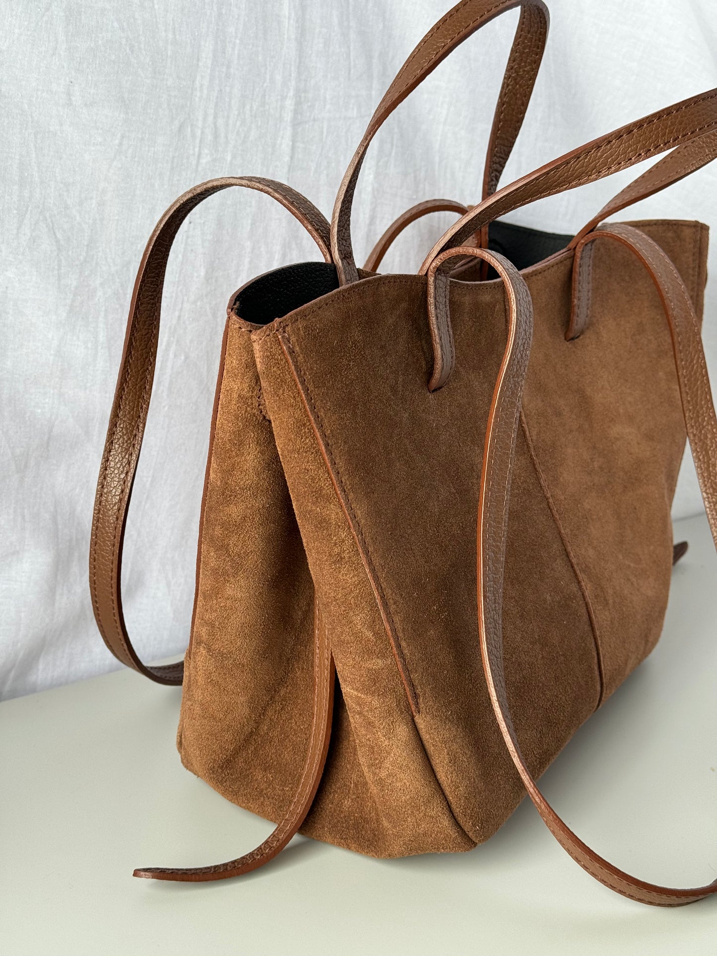borsa con doppi manici magnetici