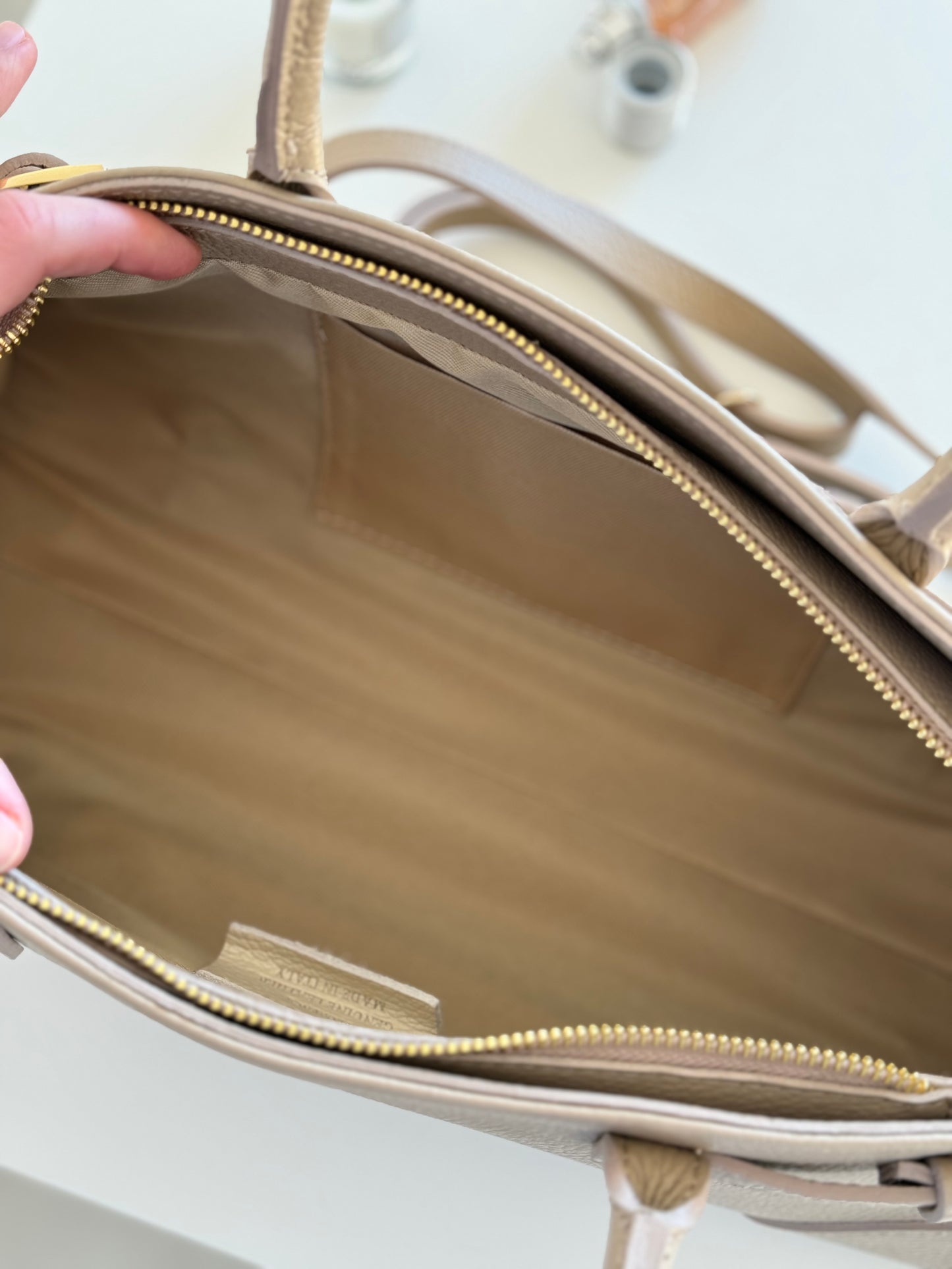 borsa con manico e tracolla