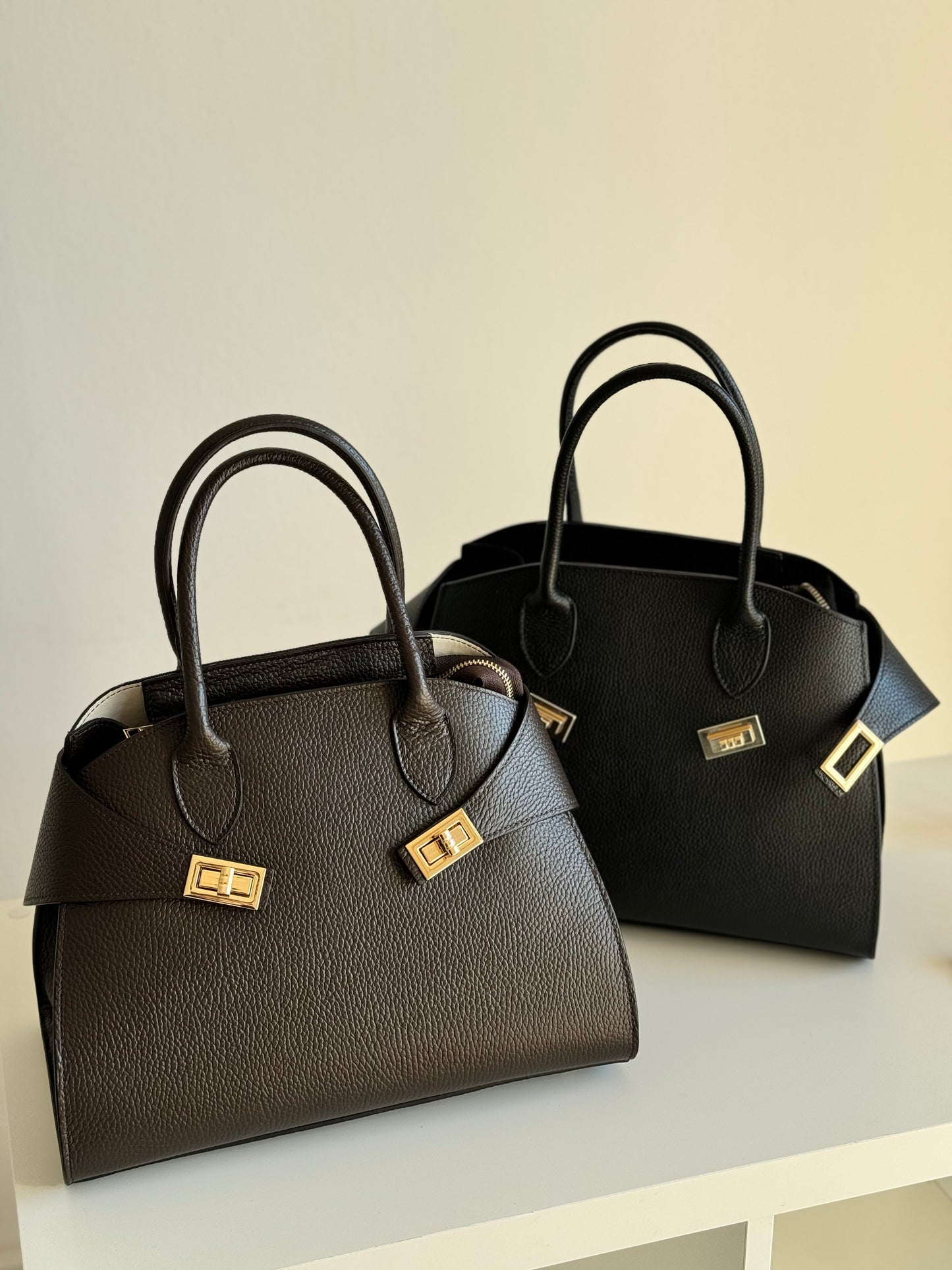 borsa con manico e tracolla