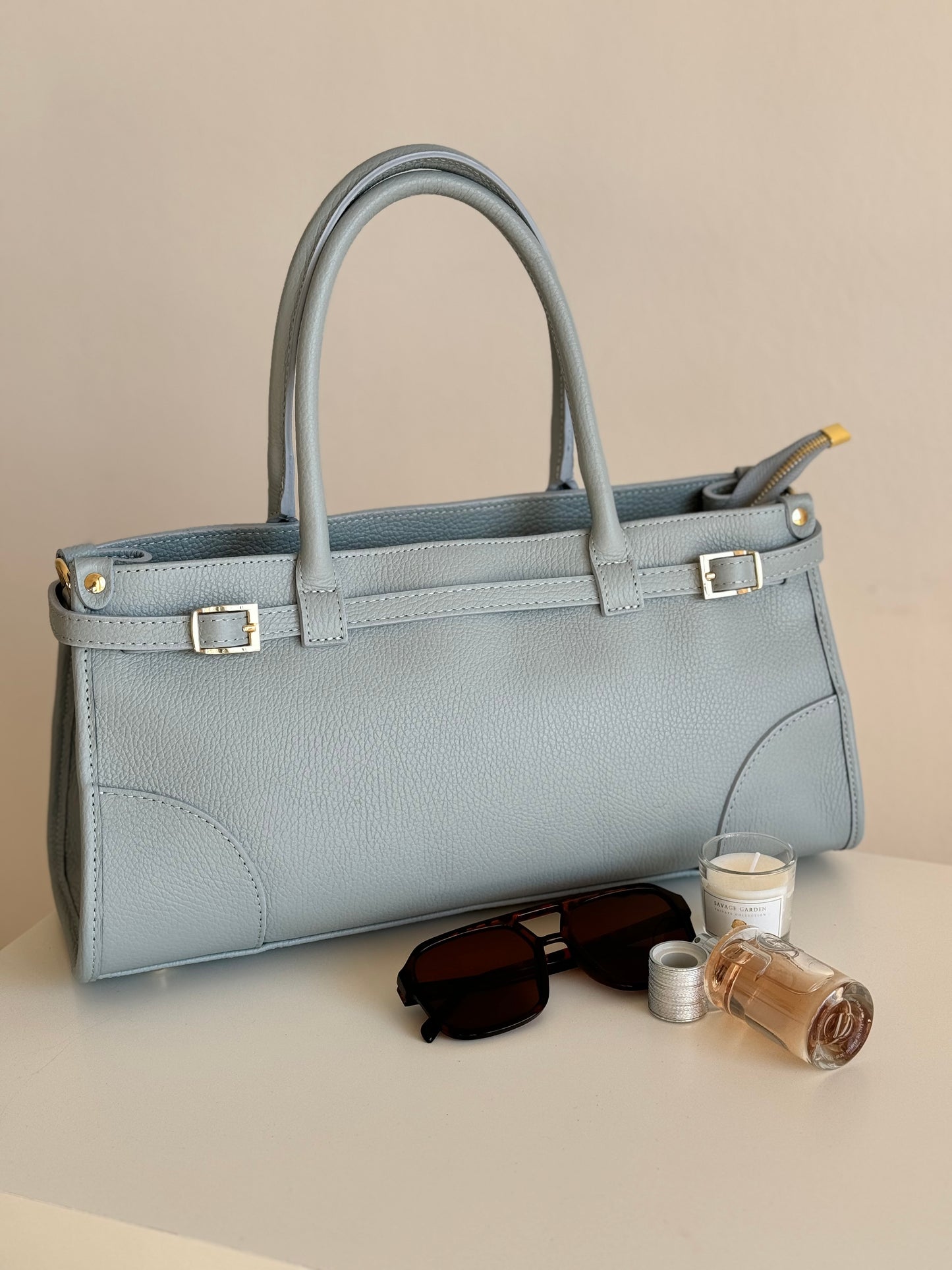 borsa con manico e tracolla