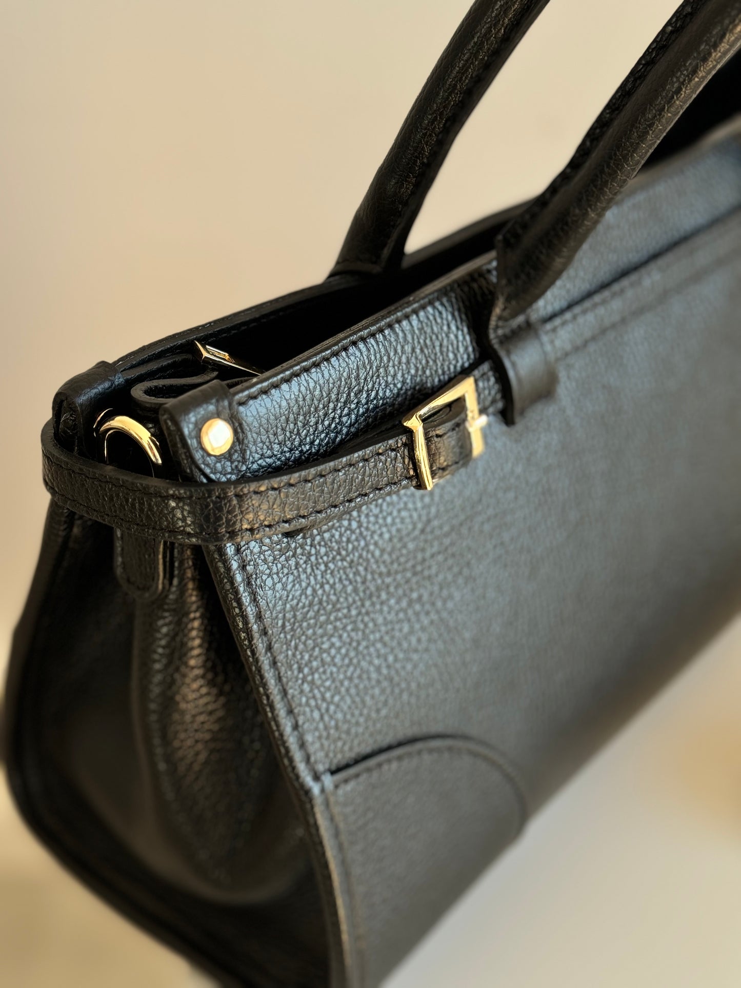 borsa con manico e tracolla