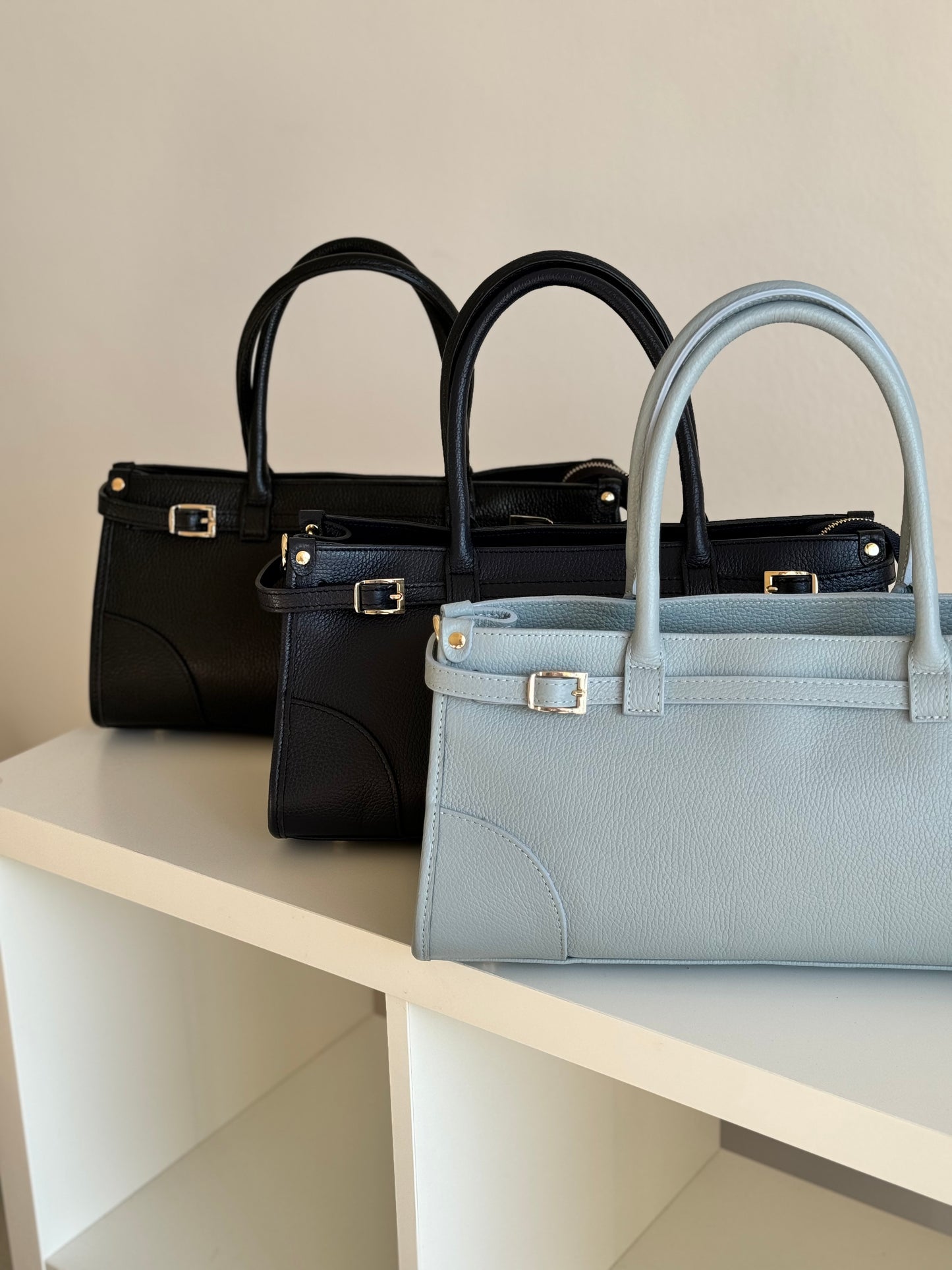 borsa con manico e tracolla